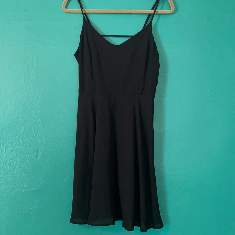 Silky Little Black Dress with fun string back from Lush